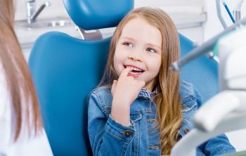 How Do Dental Implants Help Your Child With a Broken Tooth?